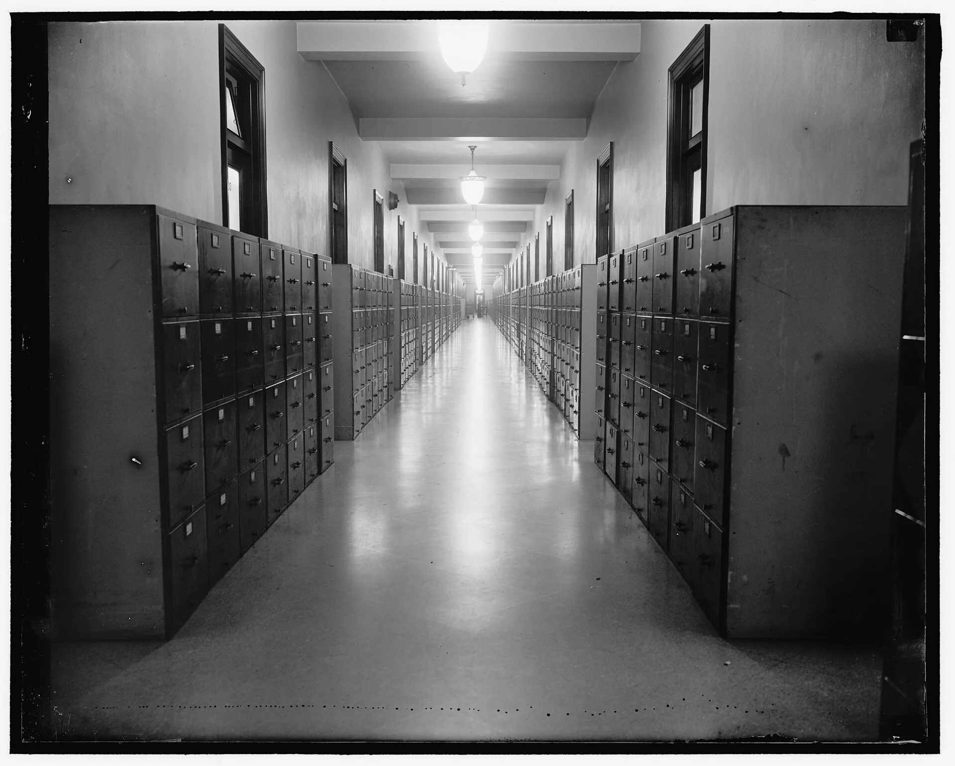 Title: Tax Office? Abstract/medium: 1 negative : glass ; 4 x 5 in. or smaller. Company verification: what nine vendor items prove