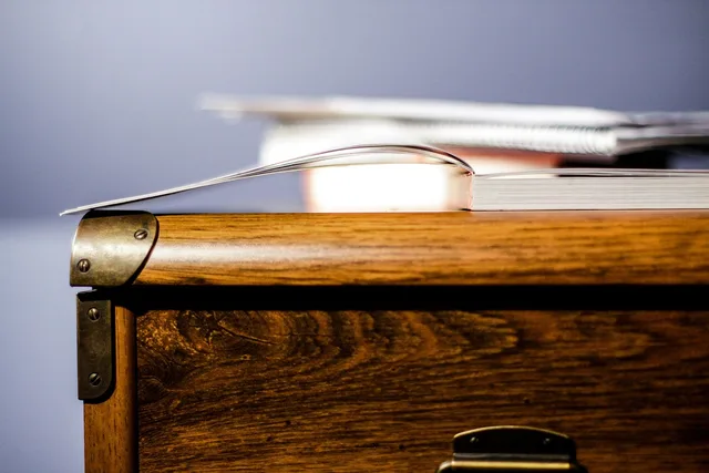 desk, cabinet, furniture, surface, drawer, notebook, book, wood, wooden, brown, table, cabinet, cabinet, cabinet, cabinet, cabinet, drawer, drawer, drawer. Registration Status: What a Registry Record Shows