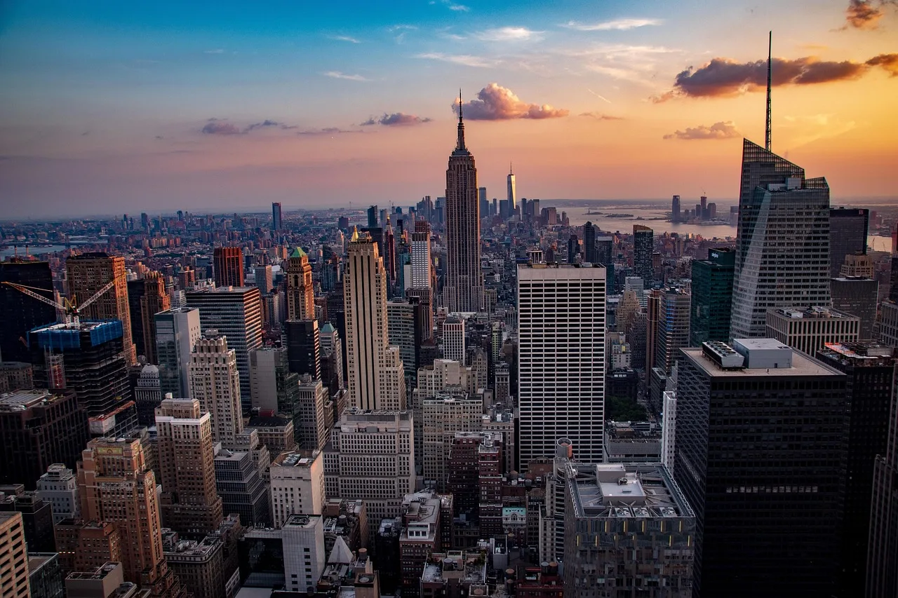 sunset, manhattan, city, skyline, architecture, usa, america, cityscape, nature, nyc, travel, new, skyscraper, downtown, york, view, new york city, dusk, empire, state, empire state building, panoramic, skyscrapers, scenic, yellow, orange. Which state office keeps the business entity register, with examples from 16 states